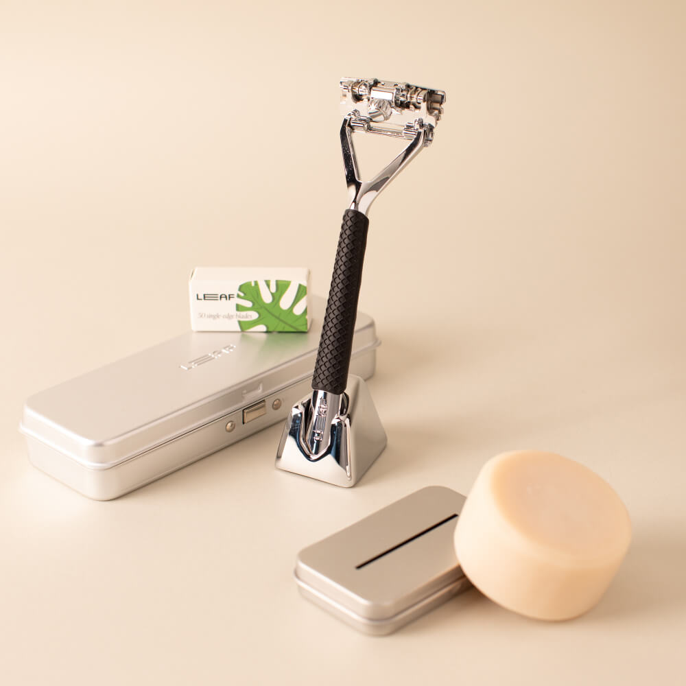 The chrome leaf super bundle with a Leaf razor, blades, case, recycling tin, and shave soap bar