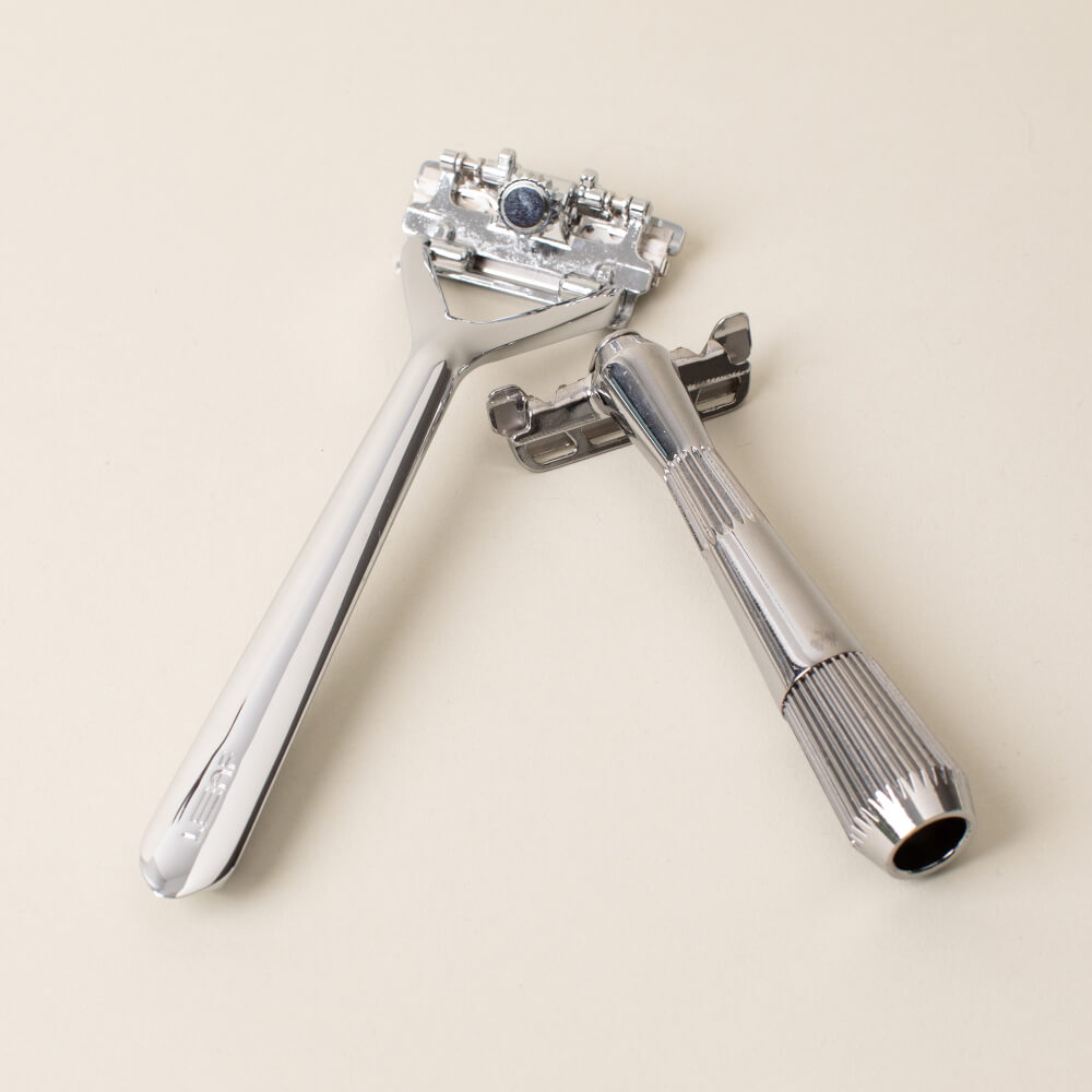 Leaf and single edge razor displayed side by side in chrome